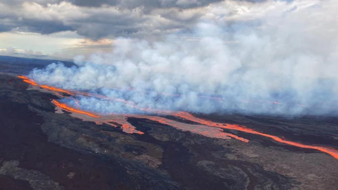 Red skies, red-hot lava: World's largest active volcano erupts in Hawaii